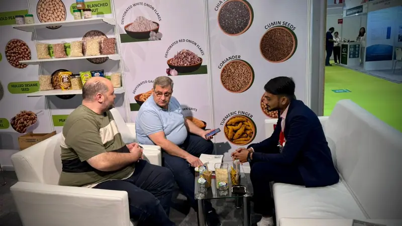 Buyers discussing products at the Elysium Agri stand