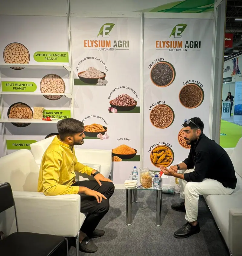 Discussion with a buyer at the Elysium Agri stand