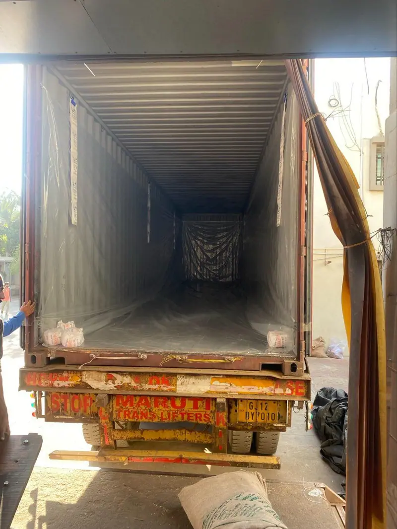 Empty container checked at the warehouse dock before stuffing