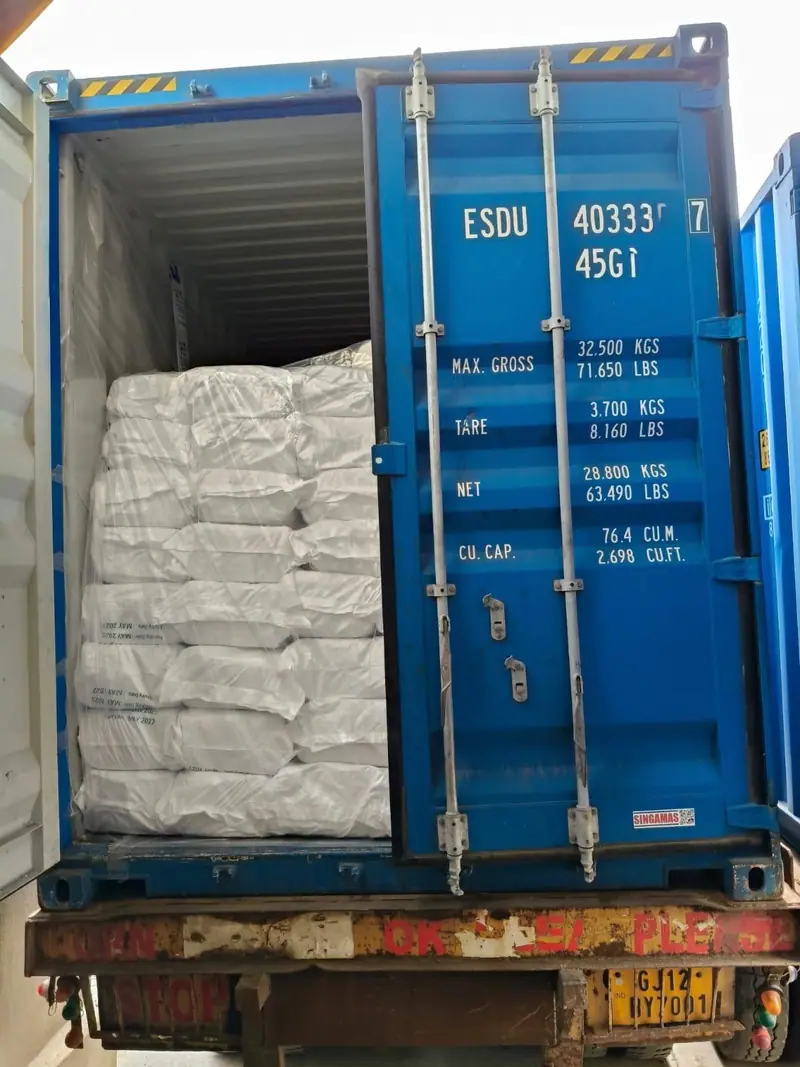 Export load of white PP bags in a 40 ft high-cube container