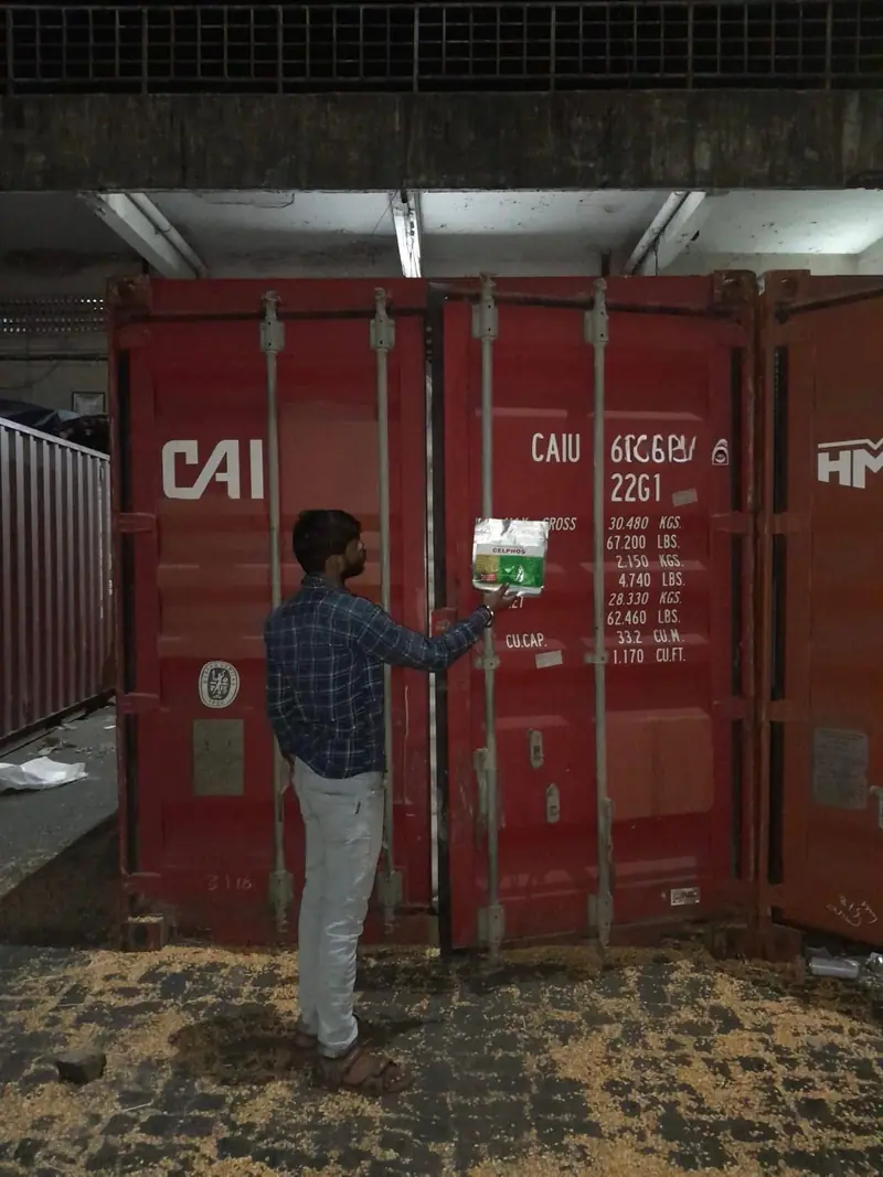 Hanging a desiccant pouch at the container door