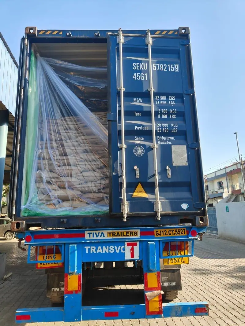 Lined 40 ft high-cube container of bagged cargo on a trailer