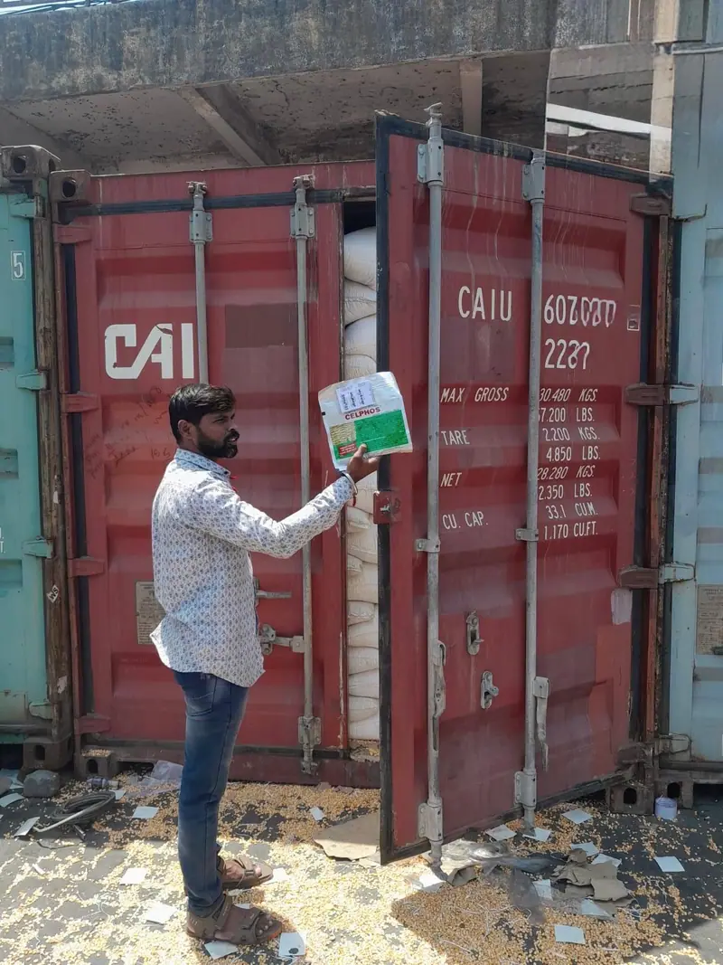 Placing desiccant in a container before the doors are closed
