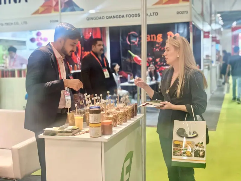 Presenting product samples to a visitor at a trade show stand