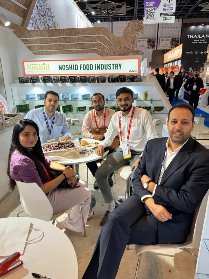 Elysium Agri team visiting an exhibitor stand