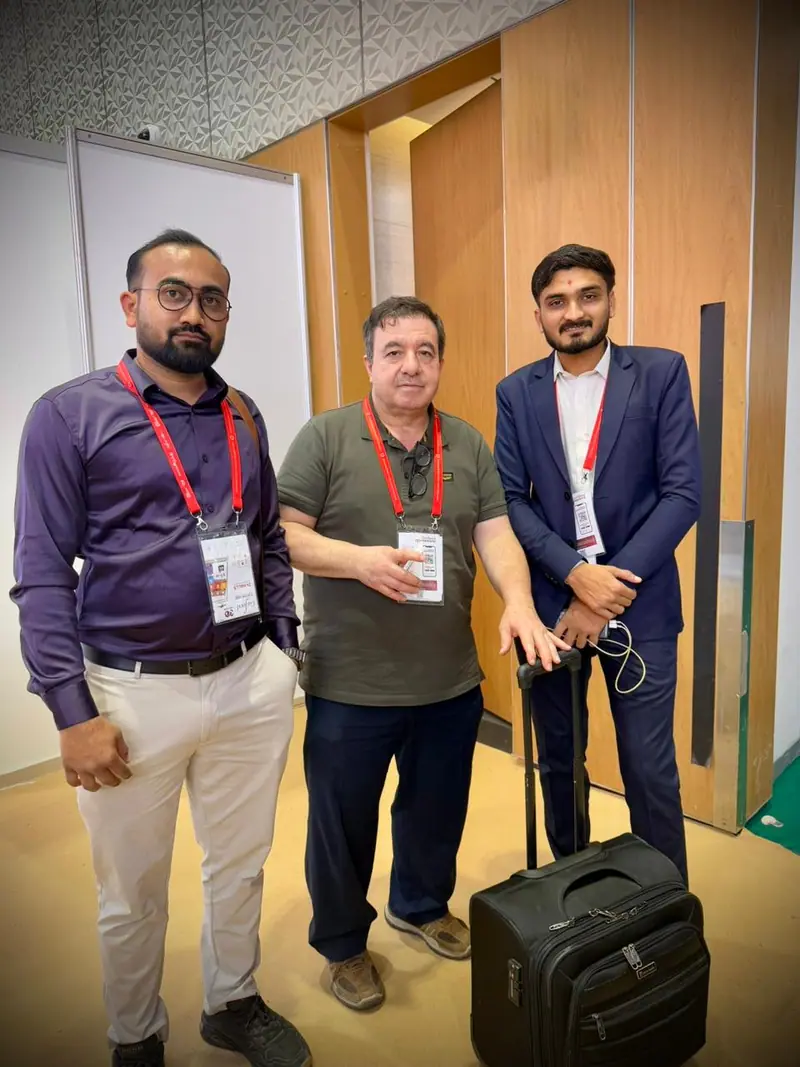 Elysium Agri team with a buyer at a trade show
