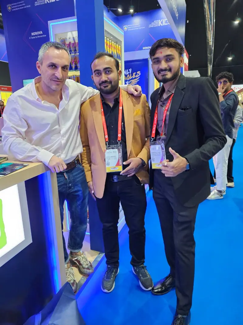 Elysium Agri team with an international partner at a trade show