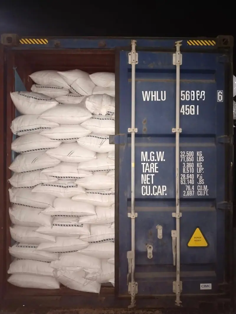 White PP bags loaded in a 40 ft high-cube export container