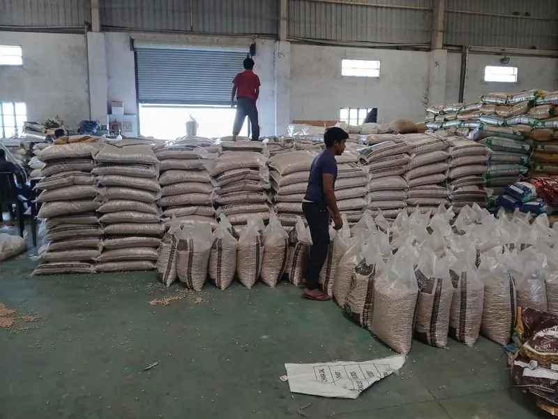 Bagged export stock checked in the warehouse before loading