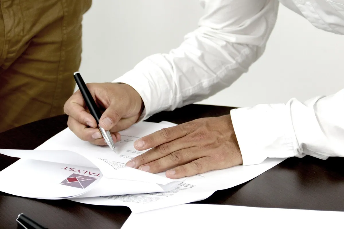 Signing a letter of credit application for an export order