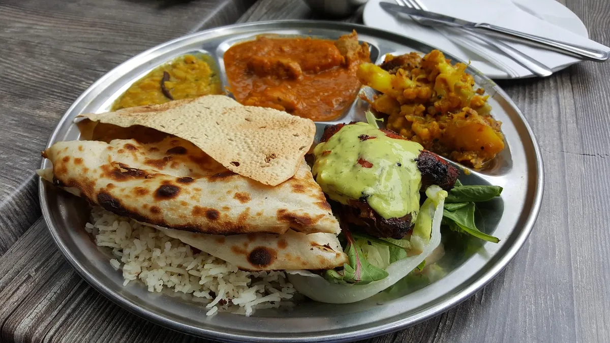 Indian thali with dal served with roti and rice