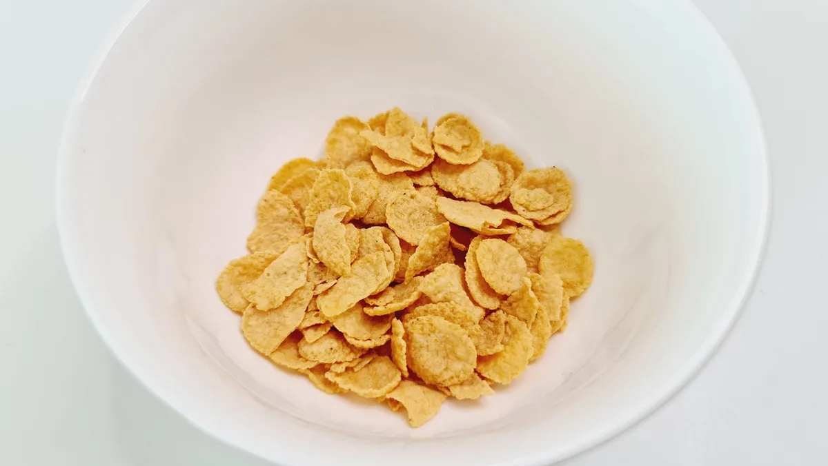 Bowl of cornflakes made from corn flaking grits
