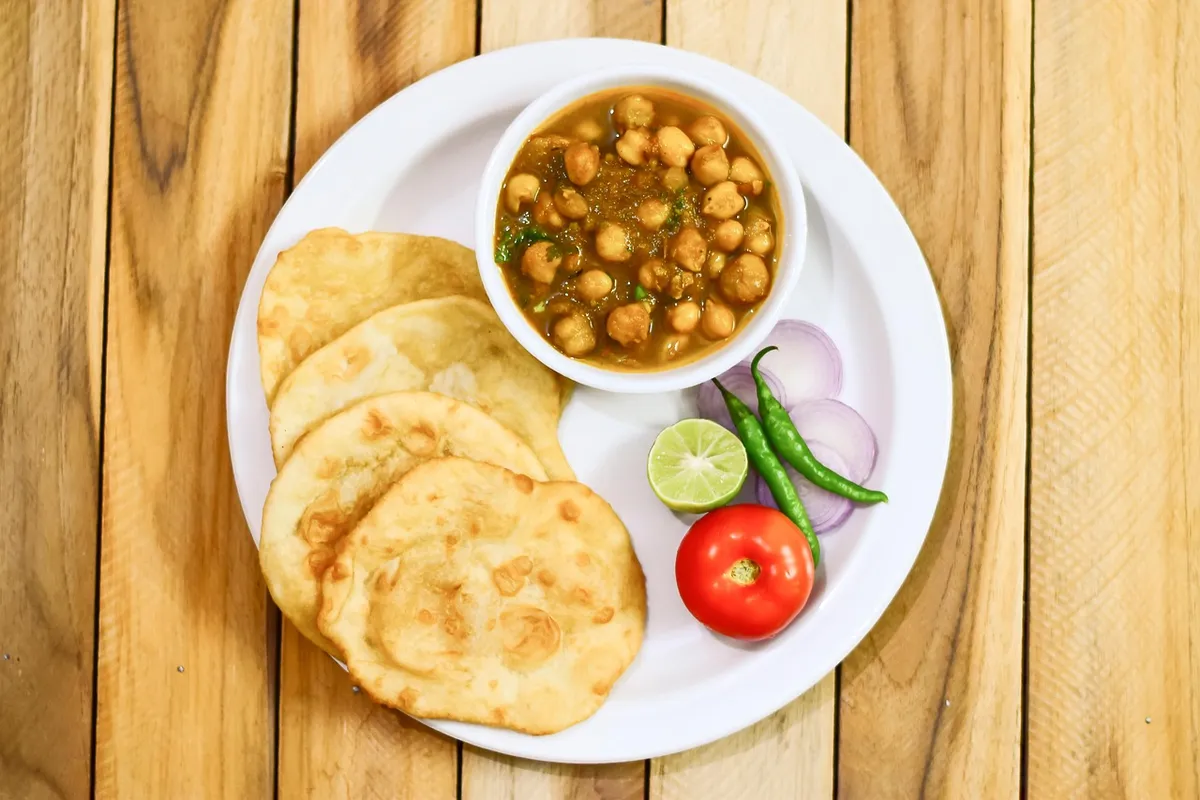Chole chickpea curry made with kabuli chana, served with bhature