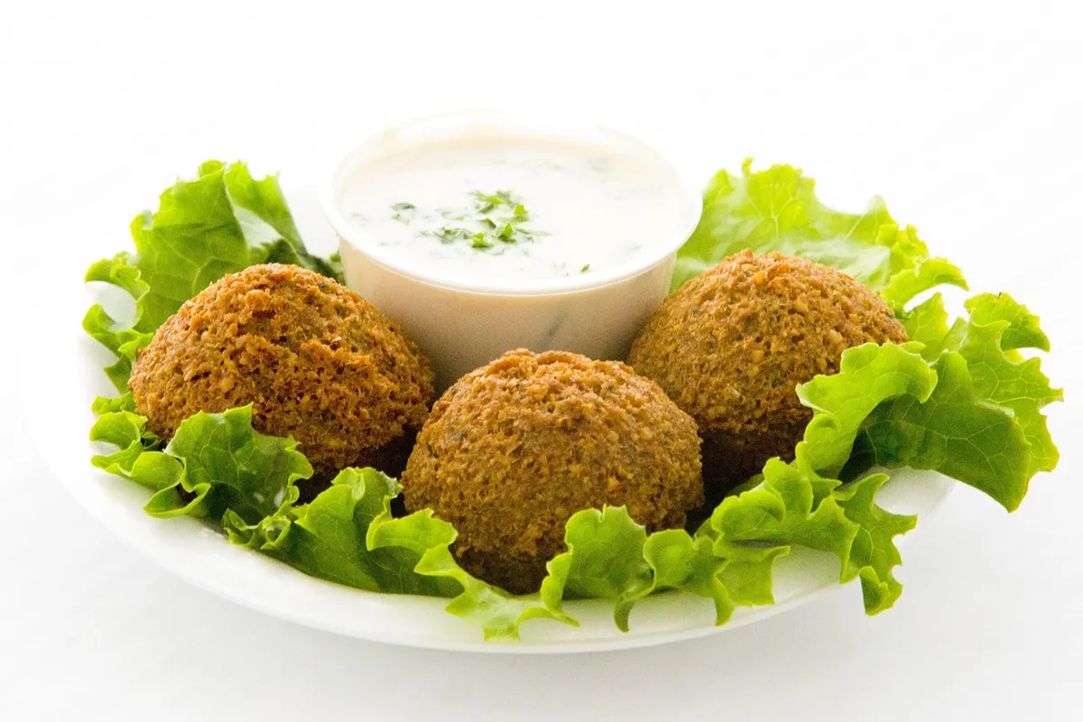 Tahini sauce made from hulled sesame served with falafel