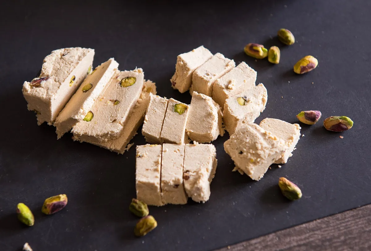 Pieces of sesame halva made with hulled sesame seeds
