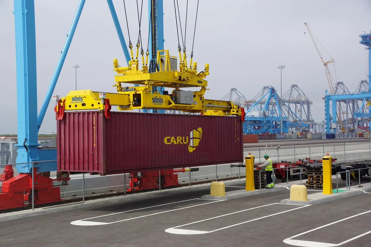 Container being lifted at a port during food import clearance