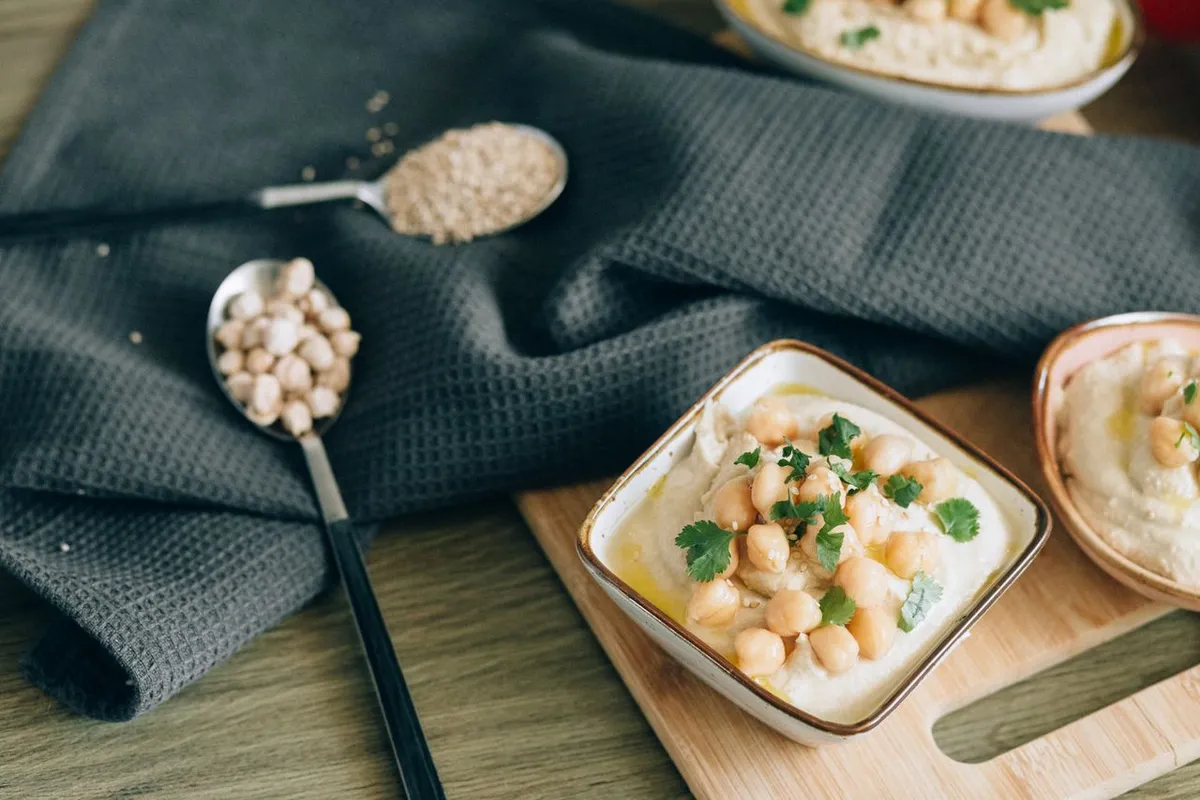 Hummus made from small kabuli chickpea sizes served in a bowl