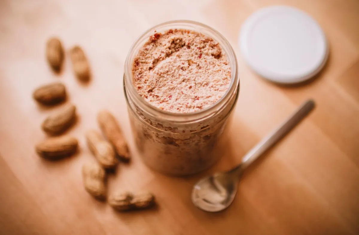 Peanut butter made from split blanched peanuts