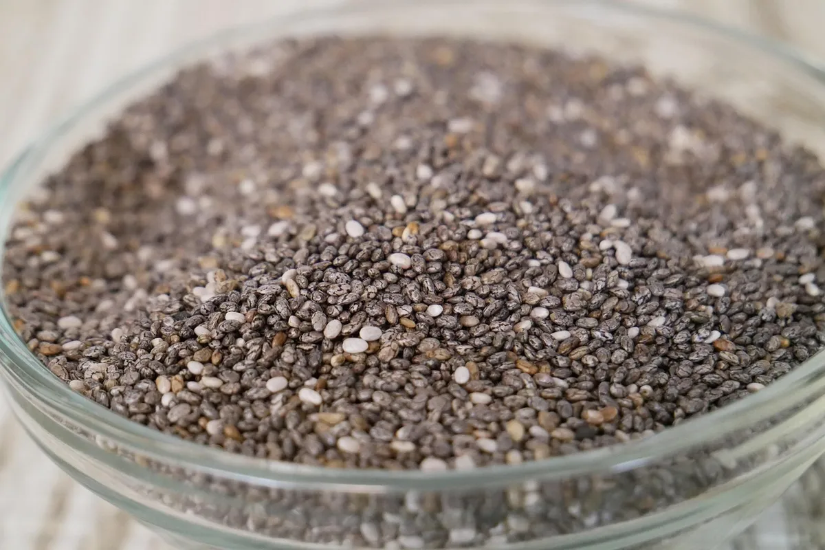 black chia seeds in a glass bowl