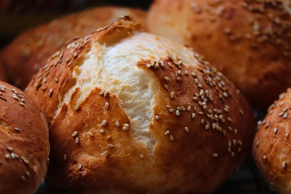 Bread buns topped with white sesame seeds